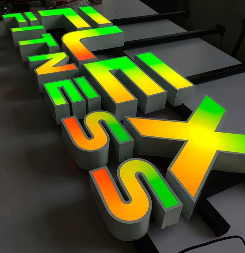 Custom 3D face-lit sign installed in a branded interior