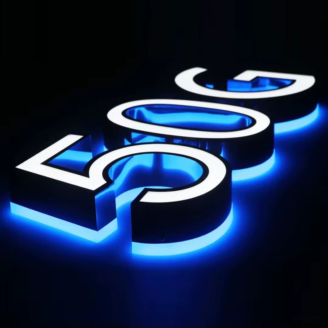 Custom 3D metal sign installed in a premium branded interior