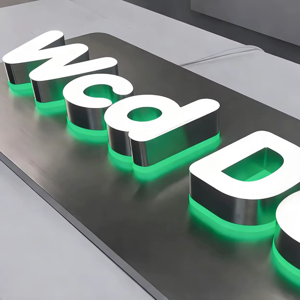 Front and back lit logo letters